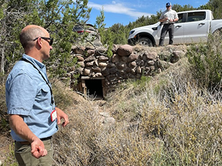 Garrett Altmann discusses a historical native, hand-built wooden and stone culvert. Garrett Altmann discusses a historical native, hand-built wooden and stone culvert.